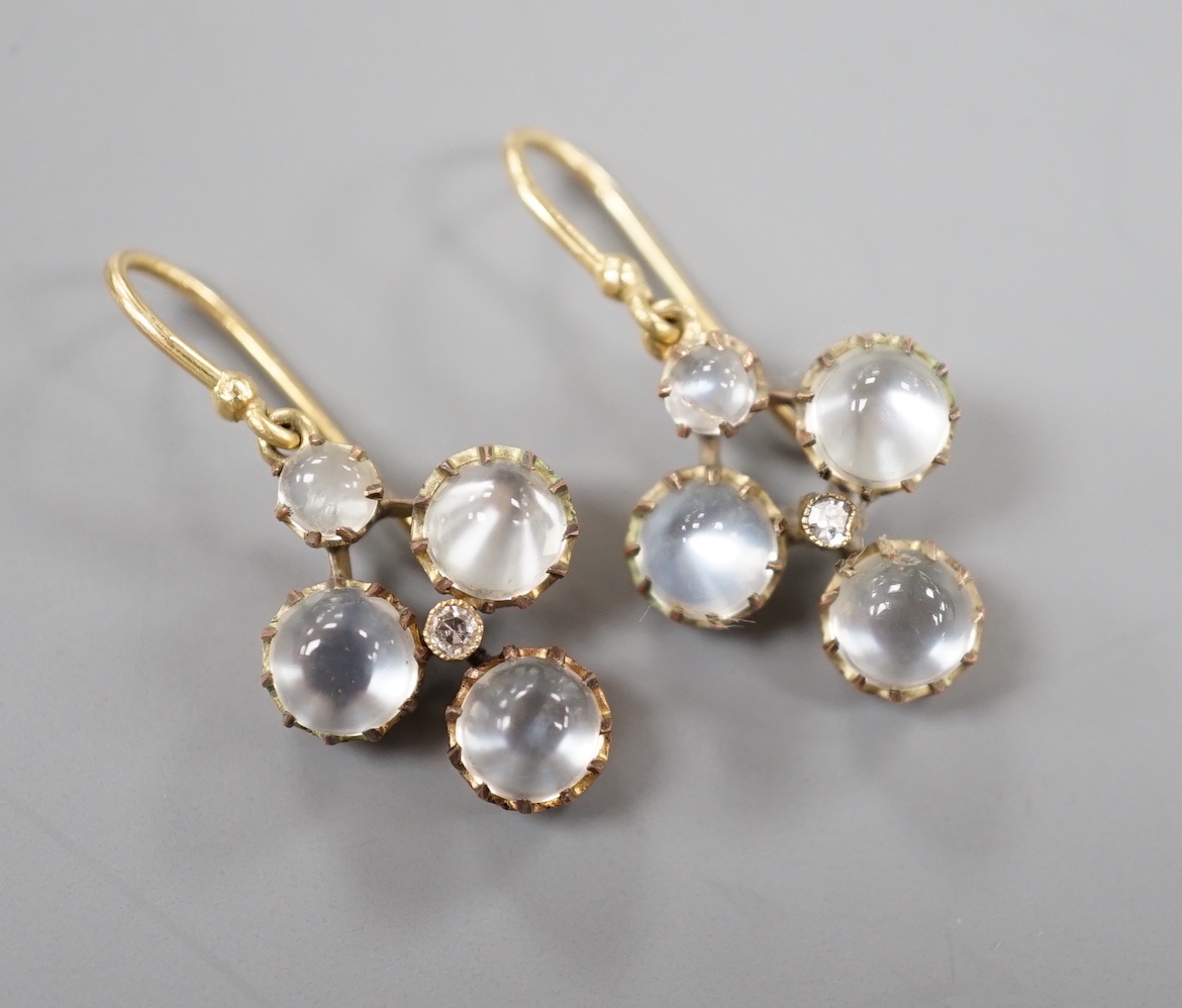 A pair of yellow metal, moonstone and diamond cluster set drop earrings, 3cm, gross weight 4.2 grams.